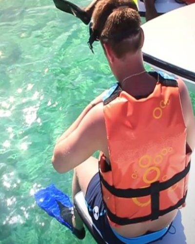 Visitors in a speedboat on a jungle tour, exploring the natural beauty of Cancun's waterways and mangrove forests.