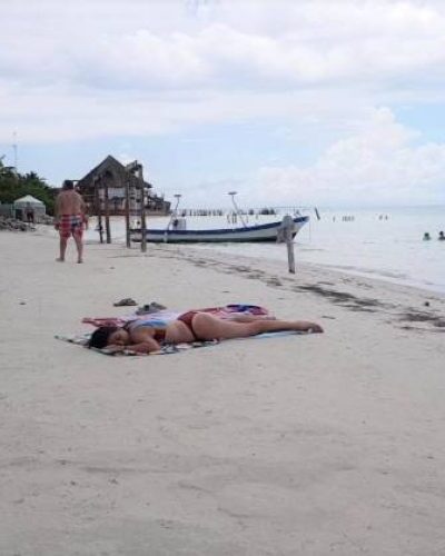 Relaxing_at_Holbox-1-qegbhvlmh10unjk47ndojbdniy341pb583nw9fdvgo