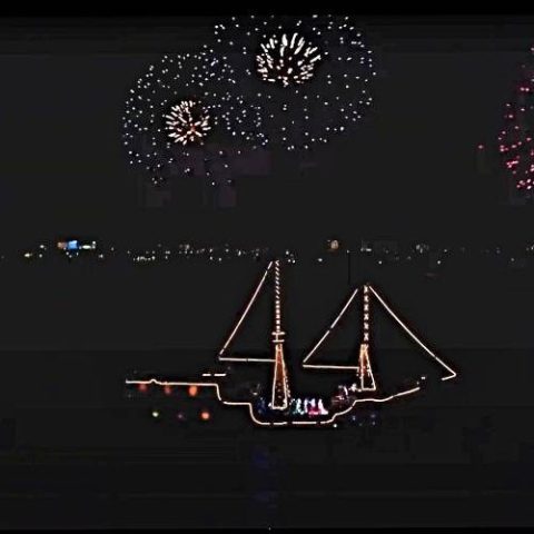 Fireworks display over the Jolly Roger pirate ship in Cancun, lighting up the night sky and adding excitement to the pirate show.