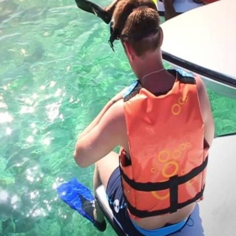 Visitors in a speedboat on a jungle tour, exploring the natural beauty of Cancun's waterways and mangrove forests.