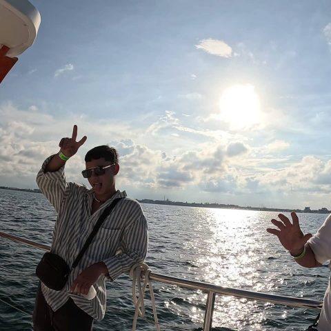 Visitors taking pictures while the sun is setting behind them Baby Dancer
