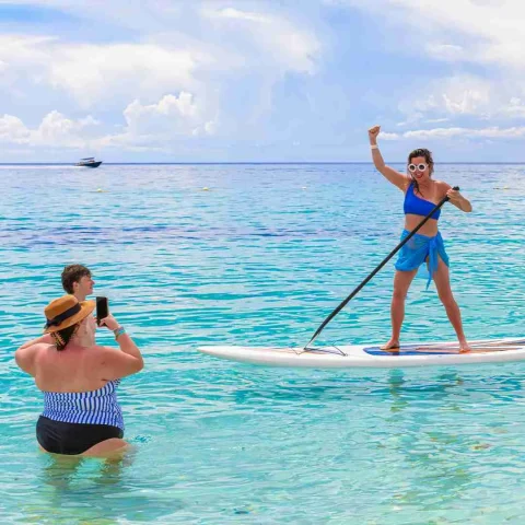 KUZÁ Escape Cozumel paddleboard beach experience