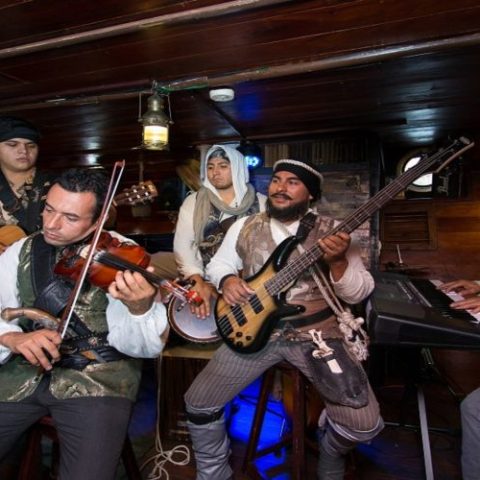 Live music performance on the Jolly Roger pirate ship, adding entertainment and atmosphere to the pirate-themed experience.